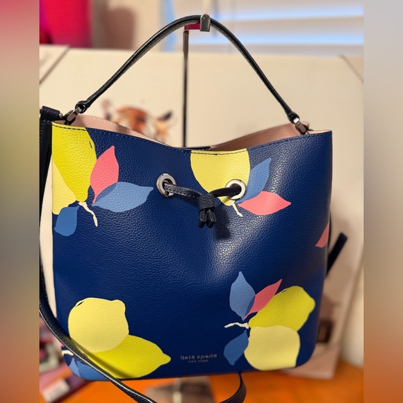 kate spade Handbags - Kate Spade Eva Lemon Zest Print Bucket Bag EUC